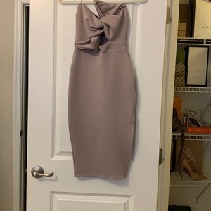Worn only once. Flattering strapless dress. Size 2 from prettylittlething